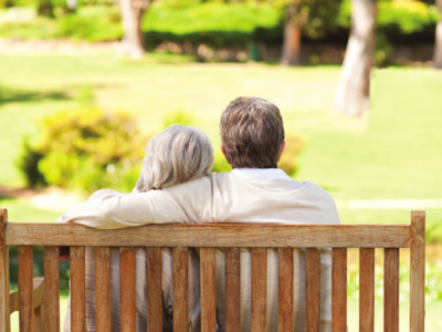 Elderly couple on bench near Four Seasons Park, Kent
